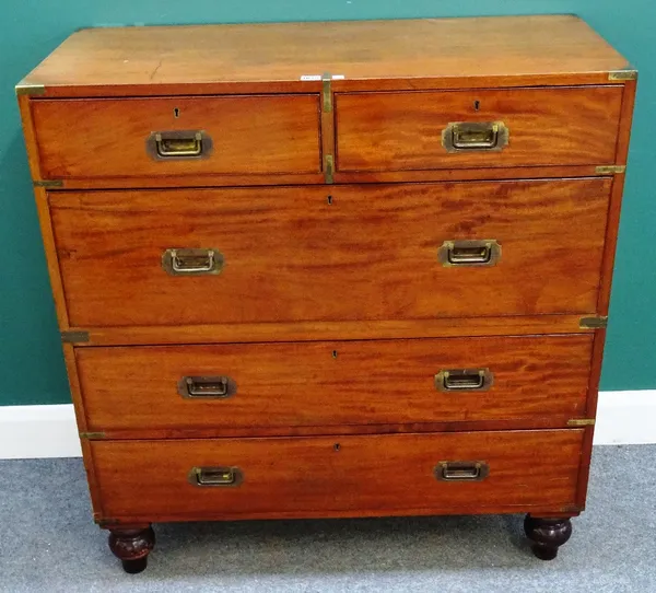 Army & Navy CSL Makers; a late 19th century mahogany and brass bound two part campaign chest of two short and three long drawers, on turned feet, 99cm