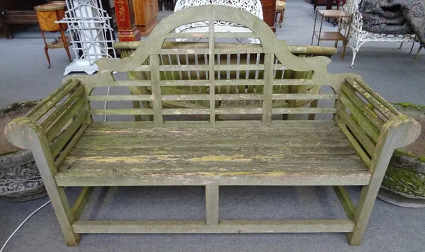 A 20th century hardwood Lutyens style wooden garden bench, 167cm wide x 106cm high.