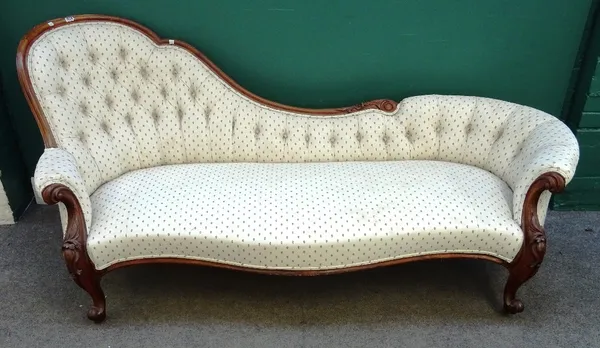 A Victorian rosewood framed spoon back chaise longue, with serpentine seat and scroll supports, 205cm wide x 92cm high.