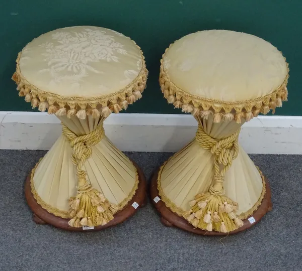 A pair of 19th century mahogany framed hour-glass shaped stools, with pleated damask upholstery, 33cm diameter x 50cm high.