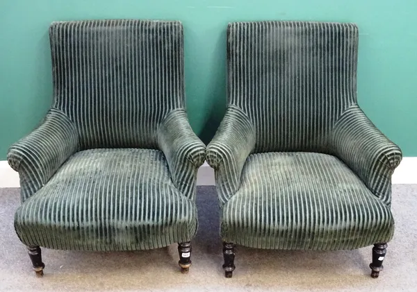 A pair of 19th century French tub back easy armchairs, on turned ebonised supports, 80cm wide x 88cm high.