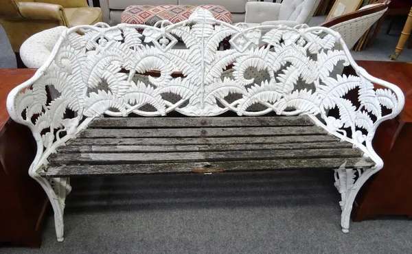 After Coalbrookdale, a cast aluminium bench, in the fern and berry pattern, 153cm wide x 90cm high.