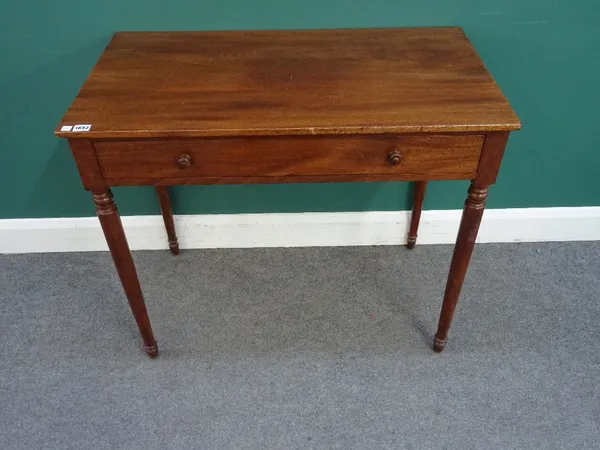 An early 19th century mahogany single drawer writing table, on tapering turned supports, 91cm wide x 78cm high x 50cm deep.