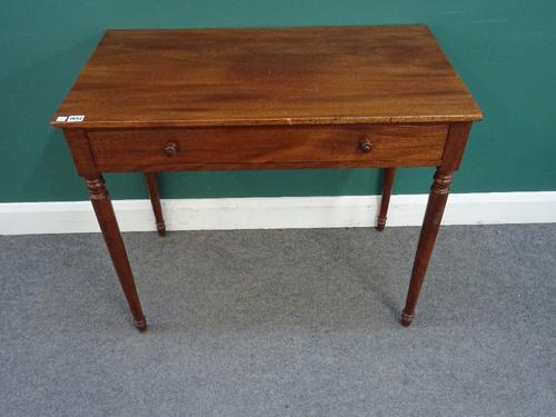 An early 19th century mahogany single drawer writing table, on tapering turned supports, 91cm wide x 78cm high x 50cm deep.