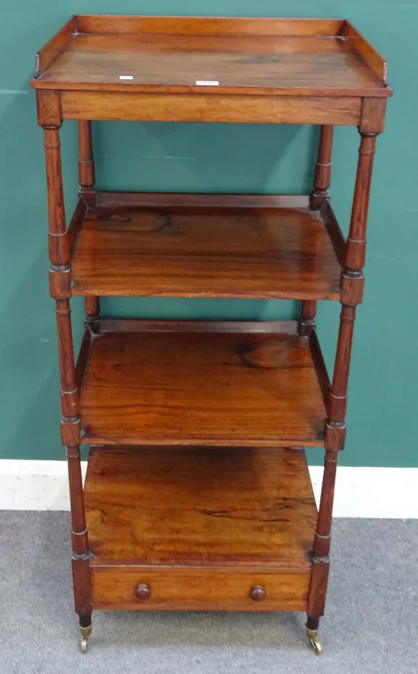 A Regency rosewood four tier what-not on turned supports, with single drawer base, 52cm wide x 120cm high x 44cm deep.