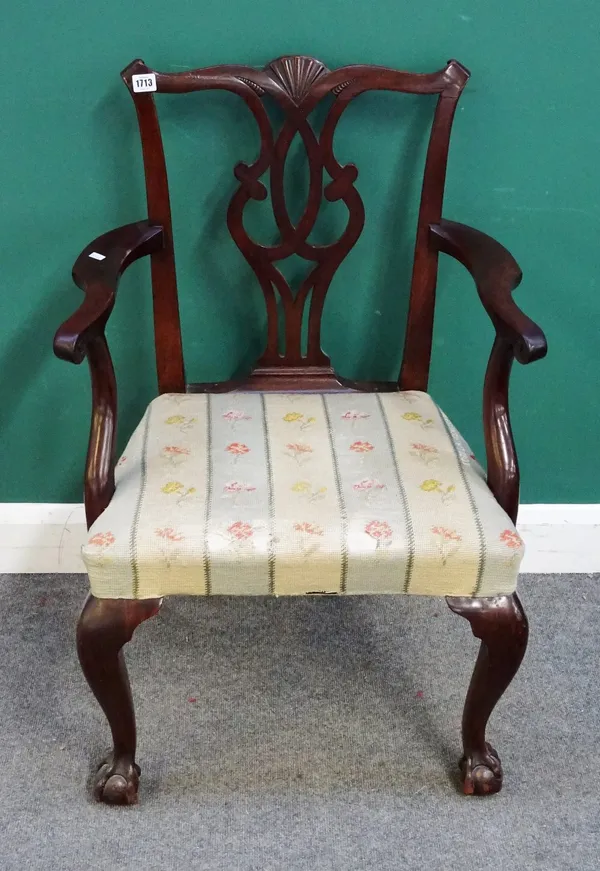A 19th century mahogany carver chair of George III style, on cabriole supports and ball and claw feet, 62cm wide x 95cm high. 7.11