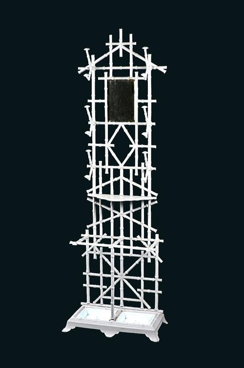 A mid-Victorian white painted cast iron faux bamboo hall stand, 67cm wide x 201cm high. Illustrated