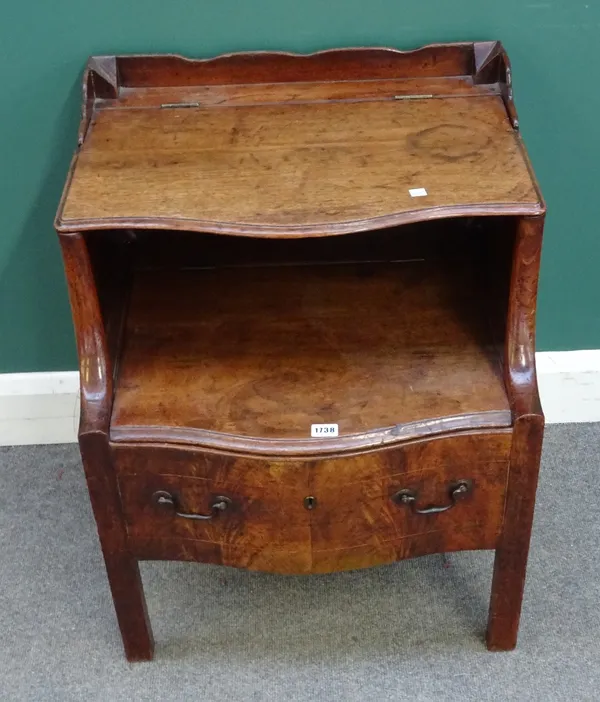 A George III inlaid mahogany two tier night stand, with serpentine base, on block supports, 56cm wide x 70cm high x 53cm deep.