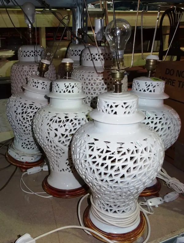 A group of seven 20th century Chinese style table lamps, with pierced bodies, (7).   S2