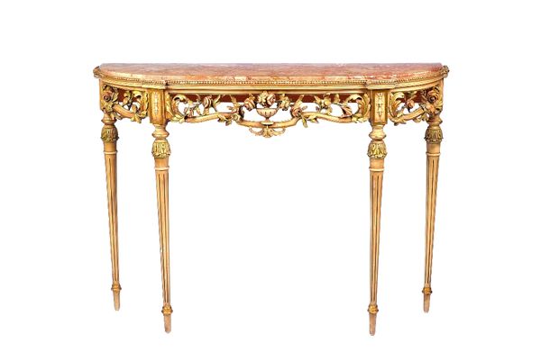 A Louis XVI style painted console table, the D shaped marble top over a pierced and carved polychrome painted floral frieze on four tapering fluted su