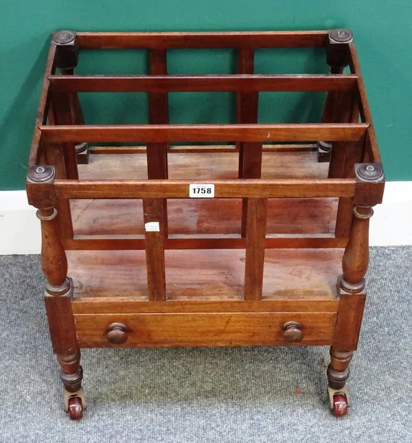 A Regency mahogany three division Canterbury, with single drawer on turned supports, 46cm wide x 49cm high x 36cm deep.