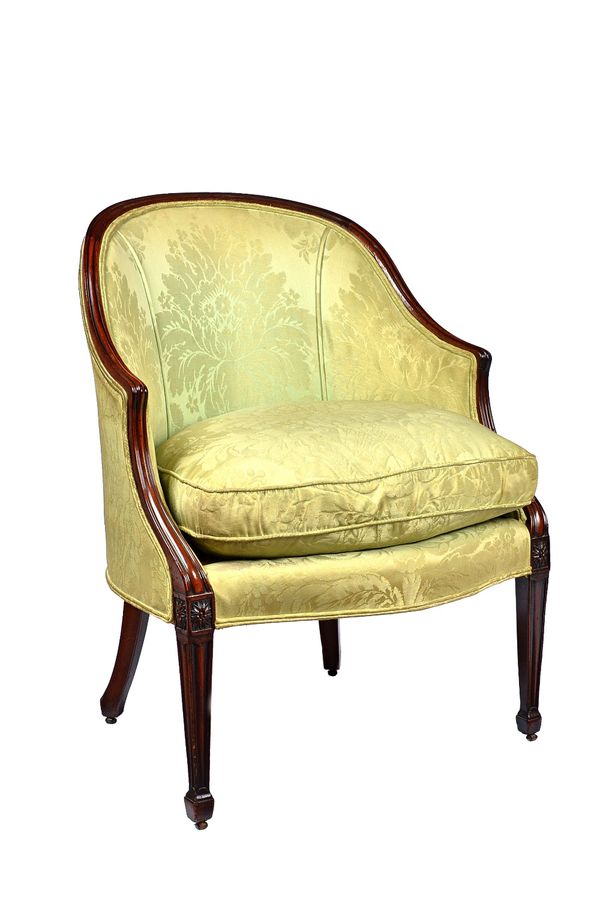 A mid 18th century mahogany framed tub back armchair, with serpentine seat on rosette capped channelled tapering square supports, NORMAN ADAMS trade l