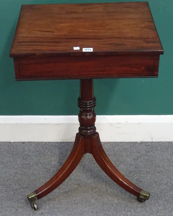 An early Victorian mahogany writing table, the angle adjustment top over fitted drawer and tripod base, 48cm wide x 75cm high x 40cm deep.
