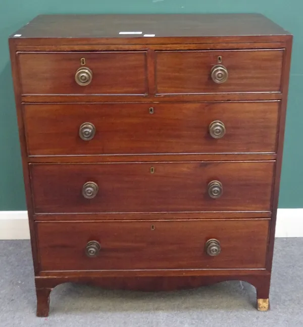 A George III mahogany chest of two short and three long graduated drawers, on bracket feet, 88cm wide x 49cm deep x 106cm high.