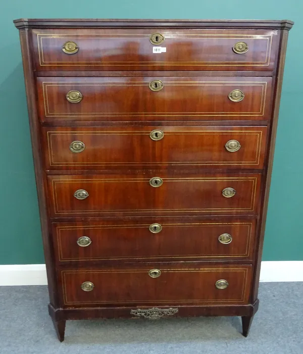 An early 19th century French brass inlaid mahogany tall chest of six long graduated drawers, on tapering square supports, 108cm wide x 153cm high x 46