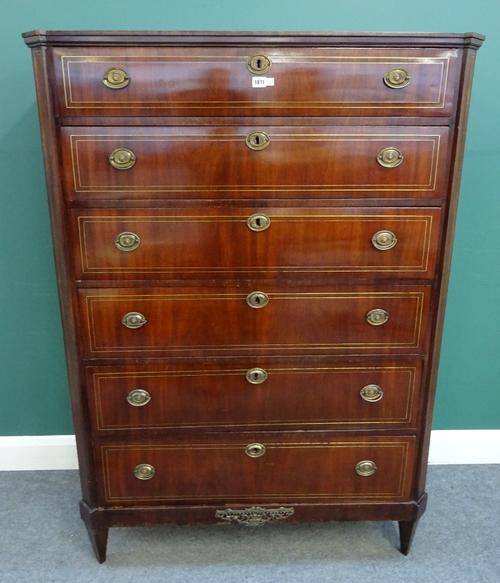 An early 19th century French brass inlaid mahogany tall chest of six long graduated drawers, on tapering square supports, 108cm wide x 153cm high x 46