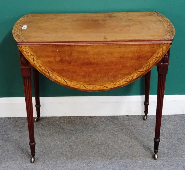 A mid-18th century marquetry inlaid mahogany Pembroke table, on tapering reeded supports, 50cm across, 98cm across when opened, 87cm wide x 74cm high.