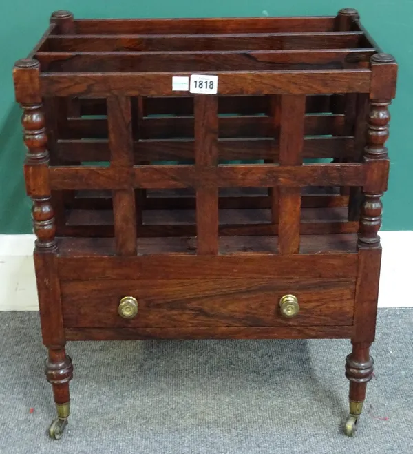 A Regency rosewood three division Canterbury, with single drawer on turned supports, 46cm wide x 55cm high x 31cm deep.
