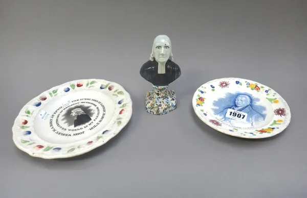 A small pearlware portrait bust of John Wesley, circa 1800, raised on a pedestal base picked out in blue, ochre, green and black, 12.5cm. high; also a