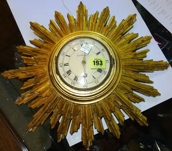 A 20th century gilt sunburst wall clock, the dial detailed 'Chap. Frodsham'.   CAB