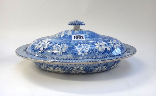 An unusual Gustavsberg blue and white printed oval vegetable tureen and cover, 1830's, the cover printed with a titled view `Abbothsford', the tureen