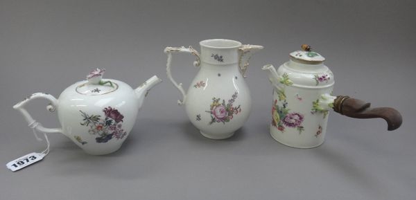 A group of Meissen porcelain, circa 1745-60, each piece painted with flower sprays, comprising; a small bullet shaped teapot and a cover, 10cm high; a