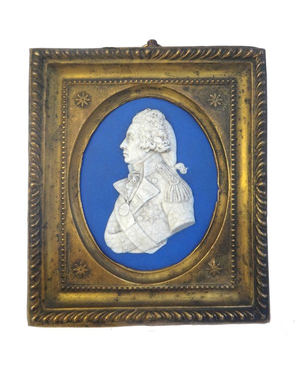 A Wedgwood oval blue jasper plaque, 19th century, detailed in relief with a bust of Nelson, impressed 'Wedgwood' to rear and housed in a wood and gilt