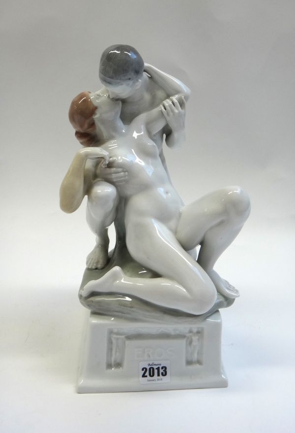 A Rosenthal porcelain figure group, 'Eros', circa 1920, modelled with a naked couple in a romantic embrace, on a titled square plinth, green printed m