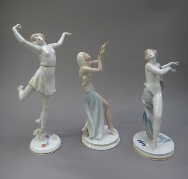 A Rosenthal porcelain ballerina figure by D. Charol, 28.5cm high, and two further Rosenthal porcelain figures, each depicting a female dancer, semi-nu