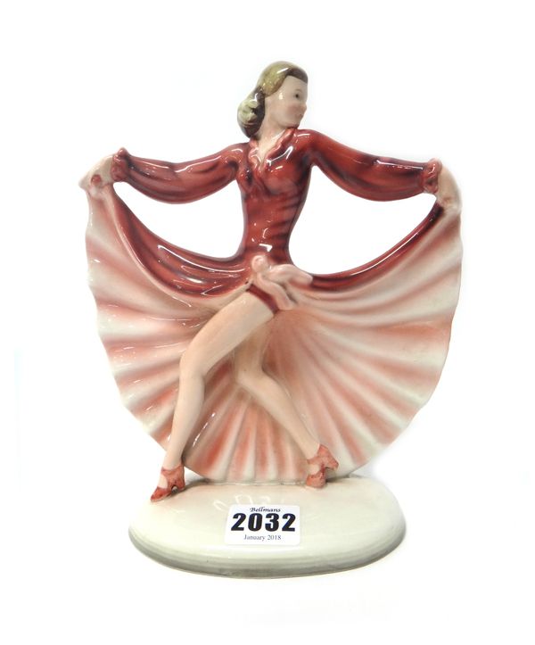 A Keramos Austrian pottery figure, circa 1930, modelled as a female Art Deco dancer in a long red dress, model no.2118, printed and impressed marks, 2