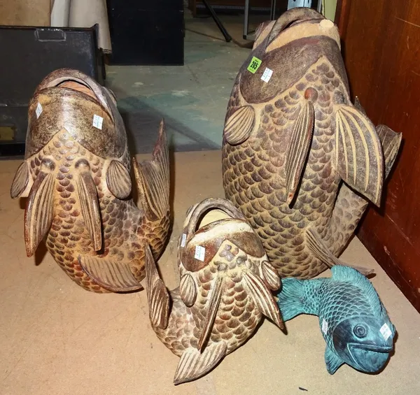 A group of four 20th century terracotta models of fish, the largest 49cm high, (4)   S1