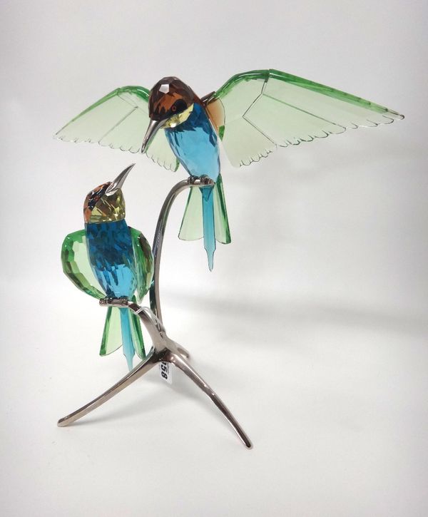 A Swarovski crystal 'Bee Eater' centrepiece, 28cm high, boxed.