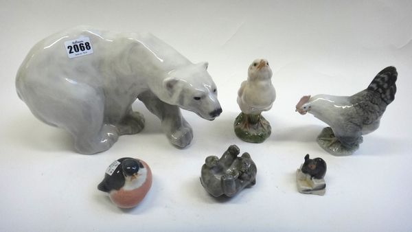 Six Royal Copenhagen porcelain animal figures comprising; a polar bear, 17cm high, a chick, a cockerel, a robin, a bear cub and a mouse, (6).