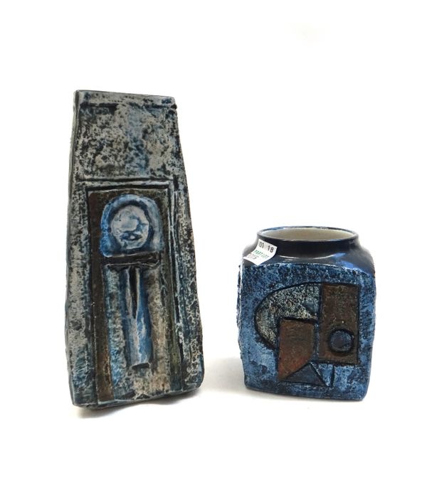 A Troika pottery coffin vase by Linda Taylor, circa 1970, decorated in greens and blues against a relief geometric body (17cm high), and a Troika marm