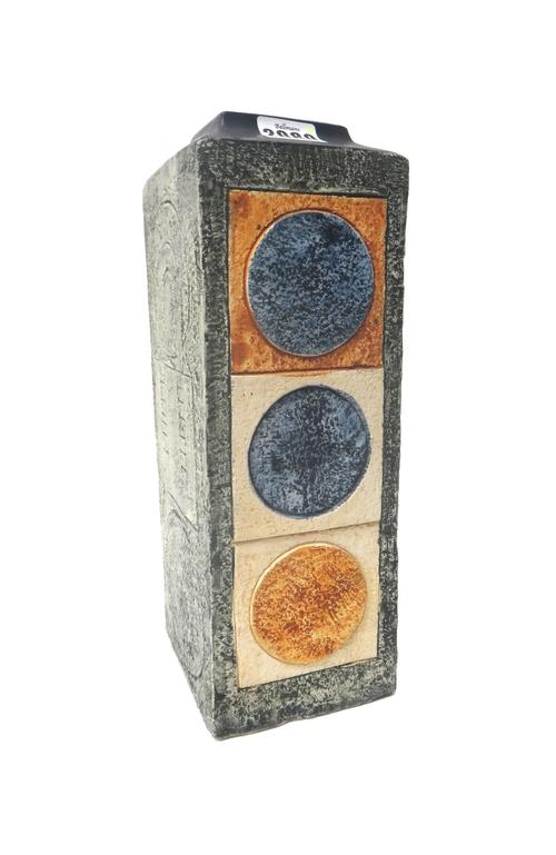 A Troika pottery slab vase by Simone Kilburn, circa 1975, polychrome painted with Aztec geometric designs against a square shouldered body, signed 'Tr