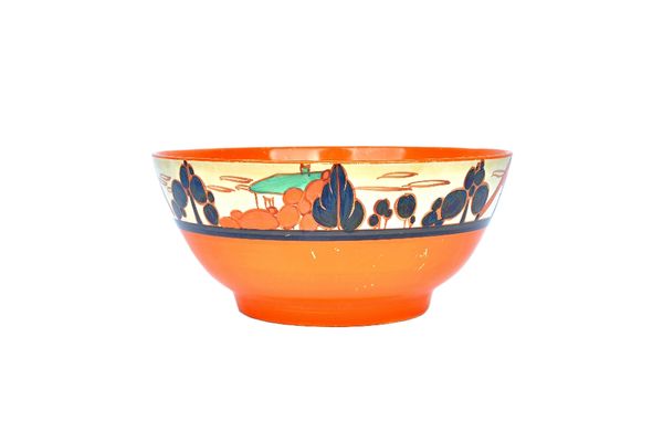 A Clarice Cliff Fantasque bowl, circa 1935, decorated in the 'Trees & House' pattern against a circular body, with black printed marks, 18.3cm diamete