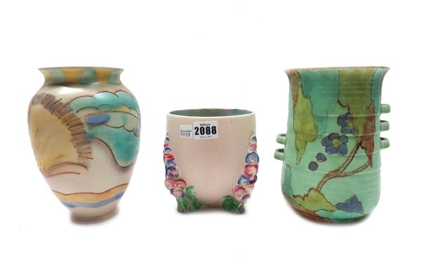 A quantity of Art Deco pottery vases, jugs and similar items, including; a Clarice Cliff  vase on a foliate triform base, 14cm high, a large Kensingto