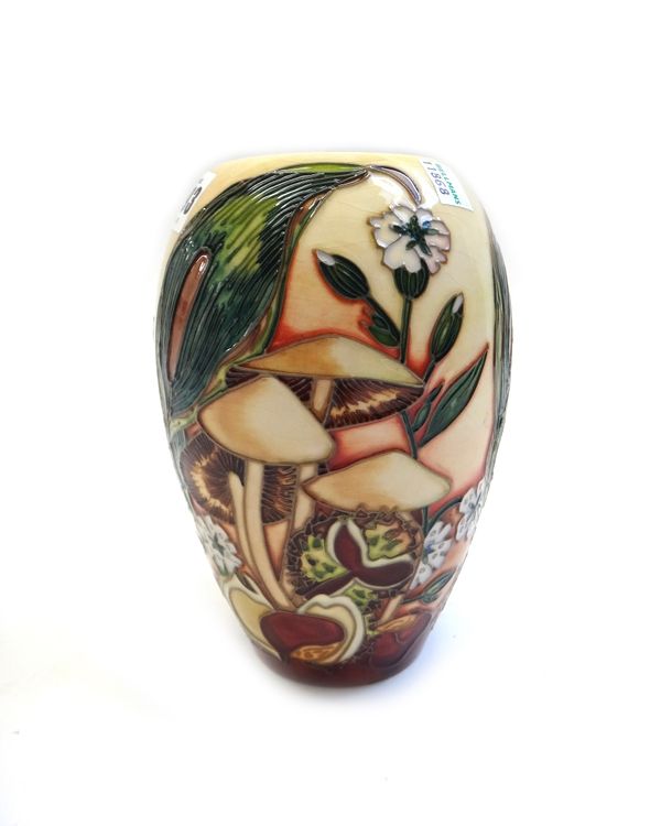 A Moorcroft limited edition 'Underwood' vase by Debbie Hancock, circa 1998, tube line decorated with toadstool and cowslip against a beige ground, Mac