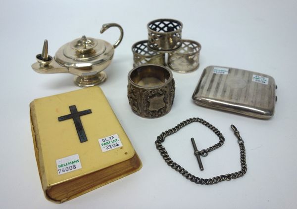 Silver and silver mounted wares, comprising; three napkin rings, with pierced decoration, Birmingham 1919, a rectangular cigarette case, Birmingham 19