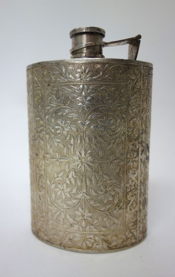 A curved rectangular spirit flask, with floral and foliate decoration, detailed Silver, gross weight 158 gms.