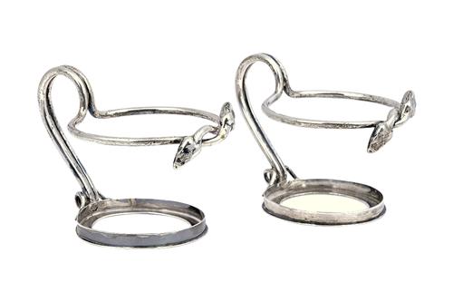 Two Russian Faberge tea glass holders, each with entwined snakes heads to the top rim and with a scrolling handle, detailed A A 84, Moscow 1896, combi