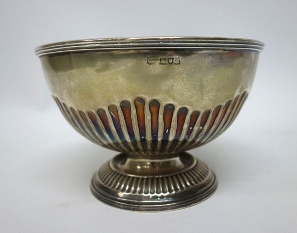 A silver trophy rose bowl, of circular form, with partly fluted decoration, presentation inscribed, the hallmark rubbed, diameter 18.5cm, weight 404 g