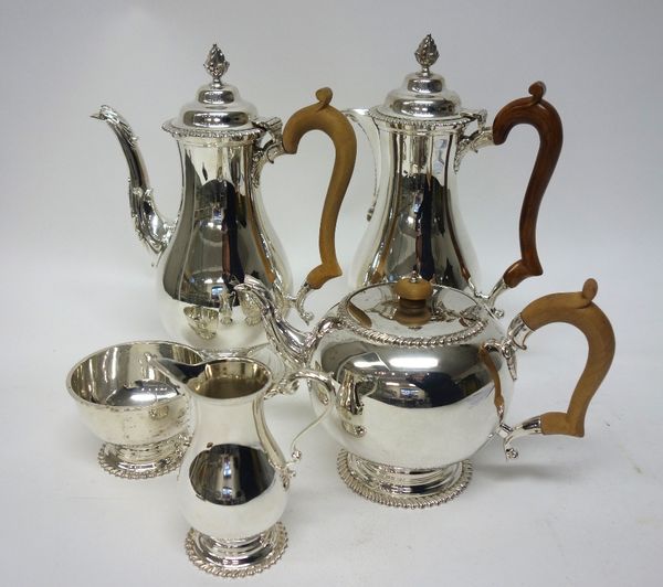 A silver five piece tea and coffee set, comprising; a teapot, a coffee pot, a hot water jug, a sugar bowl and a milk jug, each piece of baluster form,