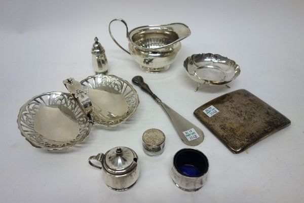 Silver and silver mounted wares, comprising; a milk jug, Sheffield 1932, a twin handled bonbon dish, with a carrying handle, London  1905, a curved re