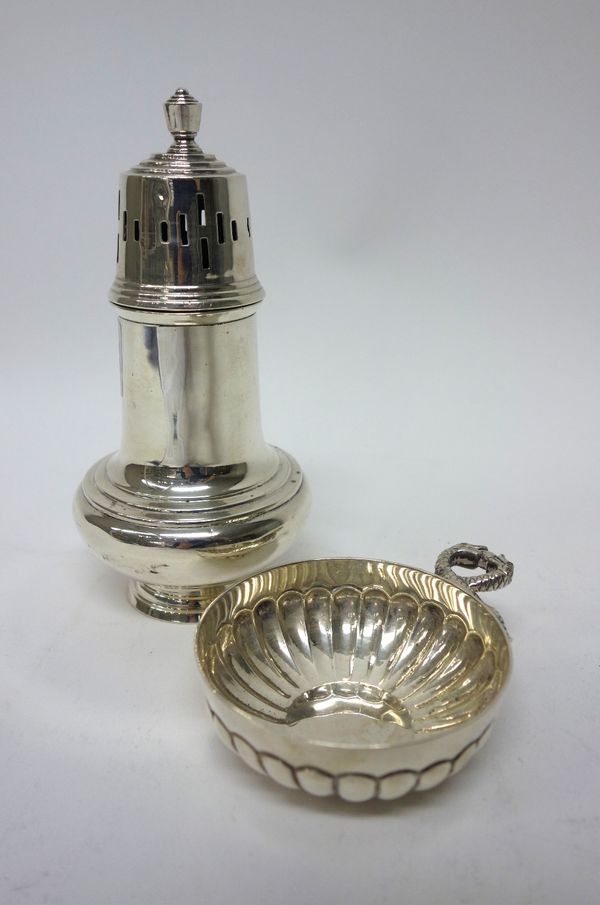 Silver, comprising; a sugar caster, decorated with a reeded band to the body, Birmingham 1937 and a wine tasting dish, of circular form, with lobed de