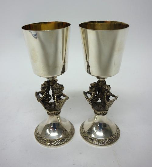 A pair of Aurum silver goblets, detailed Made by Order of The Kings, Heralds and Pursuivants of Arms, to commemorate The Quincentenary in 1984 of The