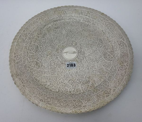 An Egyptian salver, of shaped circular form, with engraved decoration within a lobed rim, diameter 37.5cm, weight 1200 gms.