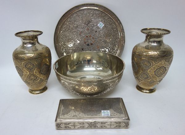 A group of Persian mostly plated wares, comprising; a circular bowl, diameter 21cm, a circular salver, diameter 25cm, a pair of baluster shaped vases,