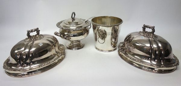 Plated wares, comprising; a pair of shaped oval meat domes, decorated with scrolled motifs, a lidded twin handled soup tureen and cover, decorated wit