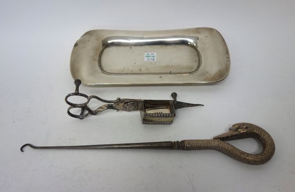 A Victorian silver handled steel button hook, the handle formed as a swan's head, London 1888, a pair of plated candle snuffers and a candle snuffer's